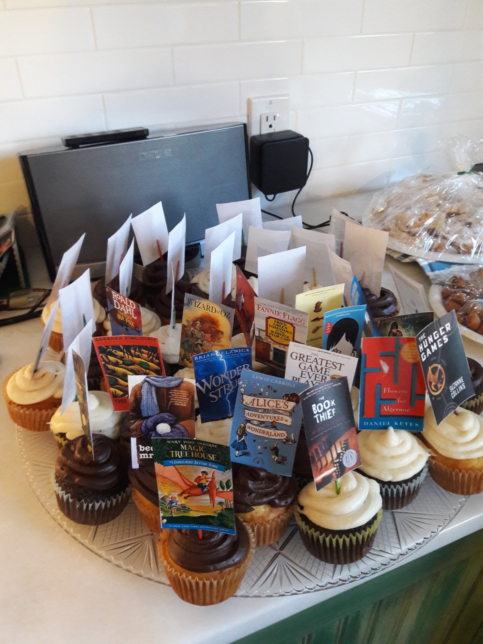 Book-themed cupcakes celebrating 2,000 nights of reading aloud