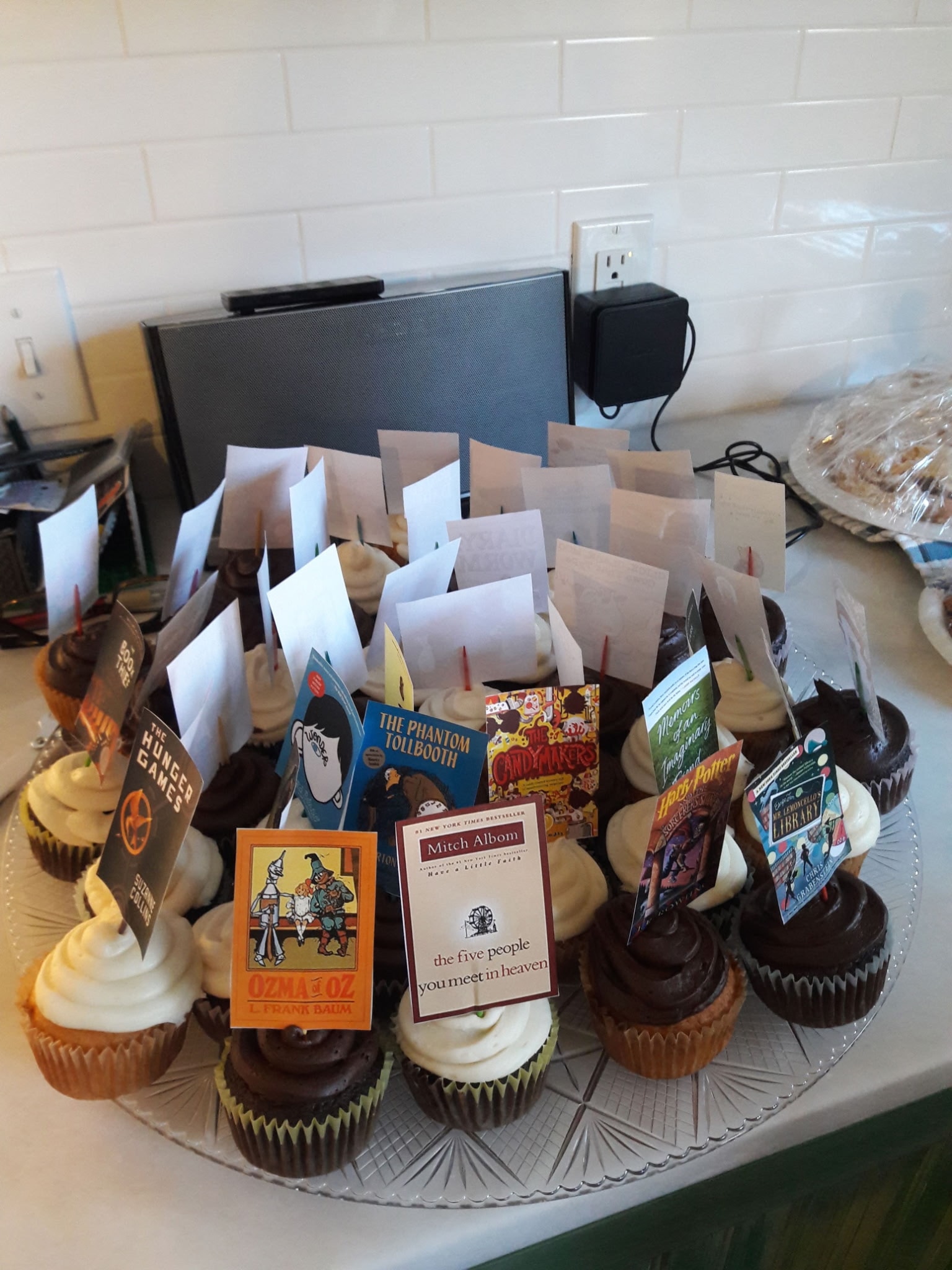 Book-themed cupcakes celebrating 2,000 nights of reading aloud