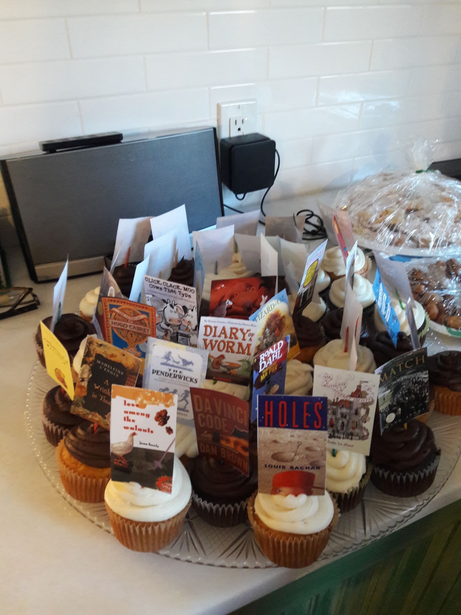 Book-themed cupcakes celebrating 2,000 nights of reading aloud